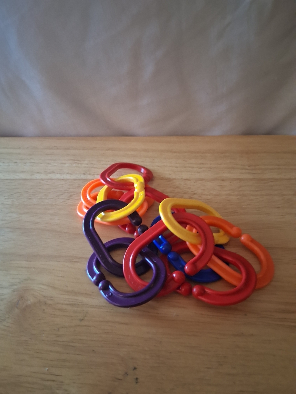 Colorful Linking Rings Toy - Purple, Red, Yellow, Orange, Blue
